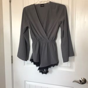 Audrey one piece Grey w/black lace trim on hem.